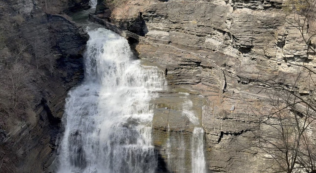 Lucifer Falls in Robert H. Treman State Park, a waterfall flowing over rocks.